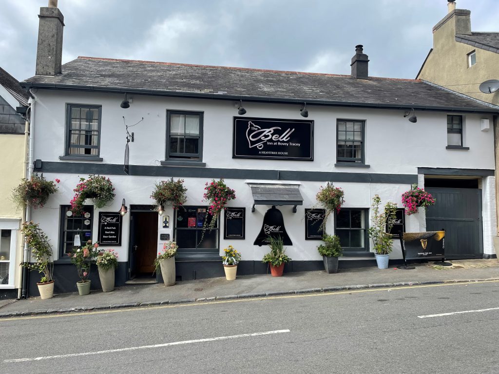 Outside of Bell Inn, Bovey Tracey with hanging baskets