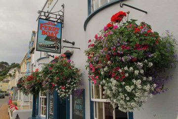 Outside of Ferry Boat Inn, Shaldon with hanging baskets