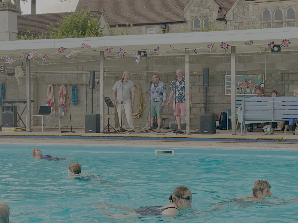 GC3 Singing to swimmers at Bovey Pool